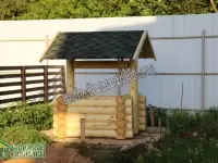 Колодец рубленый вокруг кольца