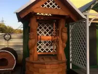 Деревянный резной колодец