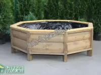 Деревянная клумба для дачи