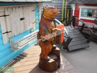 Деревянная скульптура "Медведь с гармошкой"