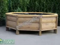 Деревянная клумба для дачи